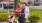 a man and woman sitting on a bench