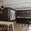 a clubhouse room with a large table and chairs