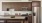 a kitchen with wooden cabinets