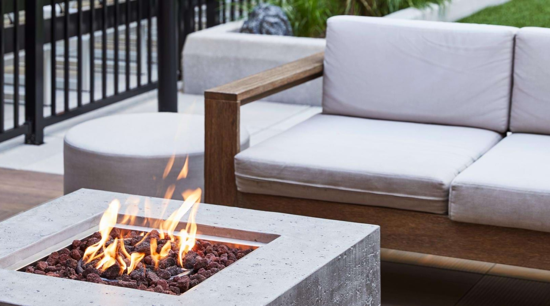 a patio area with a fireplace
