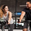 two people exercising in a gym