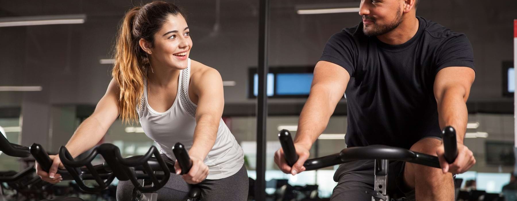 two people exercising in a gym