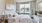 a bedroom with a large window
